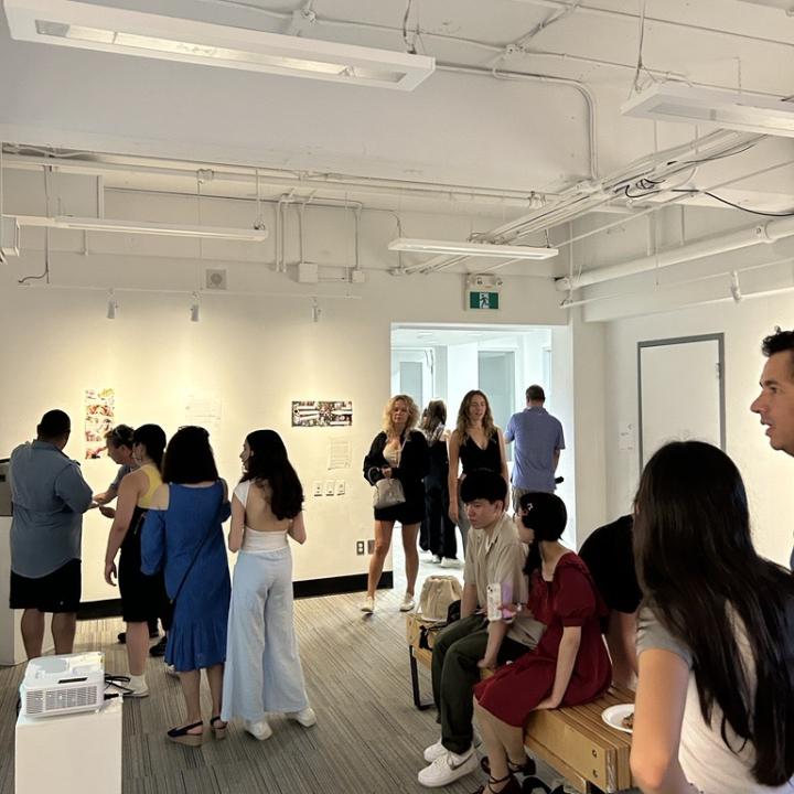 Students walking through a gallery.