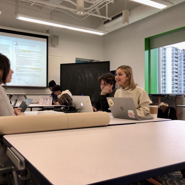 EAD Participants chatting at a table