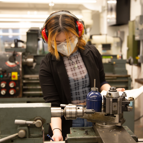 student working in woodshop