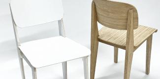 Two chairs (one white, one light brown) on a white background